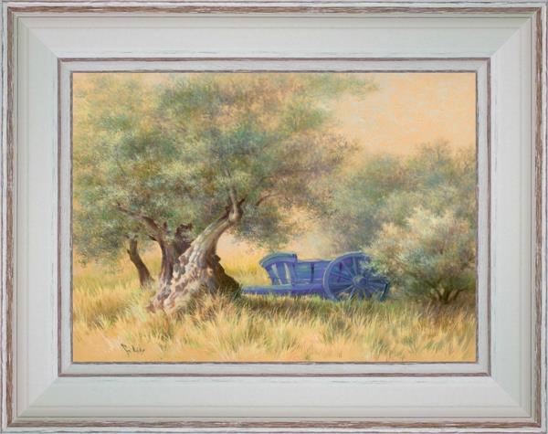 The blue cart under olive trees